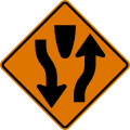 Divided highway begins road sign (MUTCD CW6-1)