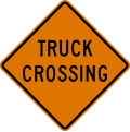Truck crossing road sign (MUTCD CW8-6)