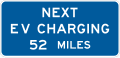 Next EV charging (distance) road sign (MUTCD D9-17a)