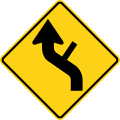 Reverse curve with side road (left) road sign (MUTCD W1-10dL)