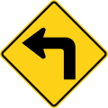 Turn (left) road sign (MUTCD W1-1L)