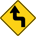 Reverse turn (left) road sign (MUTCD W1-3L)