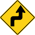 Reverse turn (right) road sign (MUTCD W1-3R)