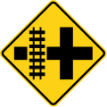 Crossroads with parallel tracks (left) road sign (MUTCD W10-2L)