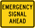 Emergency signal ahead (plaque) road sign (MUTCD W11-12P)