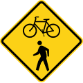 [d] road sign (MUTCD W11-15)