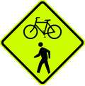 pedestrians road sign (MUTCD W11-15_(fluorescent))