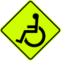 Handicapped road sign (MUTCD W11-9_(fluorescent))