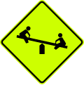 Playground road sign (MUTCD W15-1_(fluorescent))