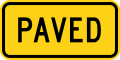 Paved road sign (MUTCD W7-4fP)