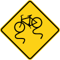 Bicycle slippery when wet ahead road sign (MUTCD W8-10)