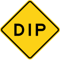 Dip road sign (MUTCD W8-2)