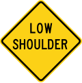 Low shoulder road sign (MUTCD W8-9)