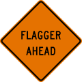 Flagger ahead (text sign) road sign (MUTCD CW20-7a)