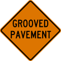 Grooved pavement road sign (MUTCD CW8-15)