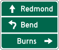 Destination (Circular Intersection) (3-lines) road sign (MUTCD D1-3d)