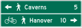 Shared-use path destination and distance (2-lines) road sign (MUTCD D11-10e)