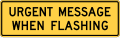 Urgent message when flashing (plaque) road sign (MUTCD D12-1bP)