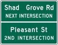 Advance street name (4-lines) road sign (MUTCD D3-2b)