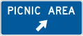 Picnic area (diagonal right arrow) road sign (MUTCD D5-10a)