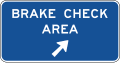 Brake check area (diagonal right arrow) road sign (MUTCD D5-14)