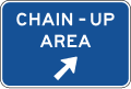 Chain-up area (diagonal right arrow) road sign (MUTCD D5-16)
