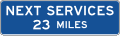Next services (distance) (plaque) road sign (MUTCD D9-17P)