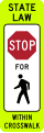 In-street pedestrian crossing road sign (MUTCD R1-6a)