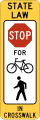 In-street trail crossing road sign (MUTCD R1-6e)