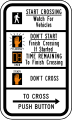 Crosswalk signal instructions road sign (MUTCD R10-3e)