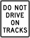 Do not drive on tracks road sign (MUTCD R15-6a)