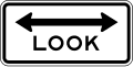 Look both ways at track road sign (MUTCD R15-8)