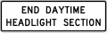 End daytime headlight section road sign (MUTCD R16-11)
