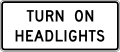 Turn on headlights road sign (MUTCD R16-8)