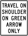 Travel on shoulder on green arrow only road sign (MUTCD R3-51e)