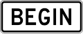 Begin (plaque) road sign (MUTCD R3-9cP)