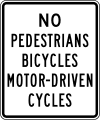 No pedestrians, bicycles or motor-driven cycles road sign (MUTCD R5-10)