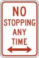 No stopping any time road sign (MUTCD R7-4a)
