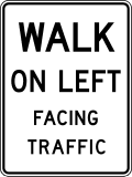 Walk on left facing traffic road sign (MUTCD R9-1)