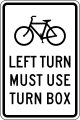 Bicycle left turn must use turn box road sign (MUTCD R9-23bL)