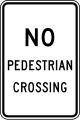 No pedestrians crossing road sign (MUTCD R9-3_a)