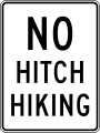No hitchhiking road sign (MUTCD R9-4a)