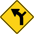 Curve with side road (left) road sign (MUTCD W1-10L)