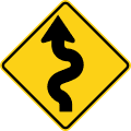 Winding road (left) road sign (MUTCD W1-5L)
