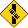 Skewed crossing ahead (left) (this supplements the W10-1 sign but does not replace it) road sign (MUTCD W10-12R)