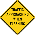 Traffic Approaching When Flashing road sign (MUTCD W2-11)