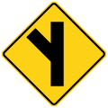 Side road at an acute angle (left) road sign (MUTCD W2-3L)