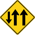 Two-way traffic (3-Lane, one lane in the opposing direction) road sign (MUTCD W6-5a)