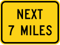 Next (distance) miles ahead road sign (MUTCD W7-3aP)