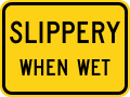 Slippery when wet (plaque) road sign (MUTCD W8-10P)
